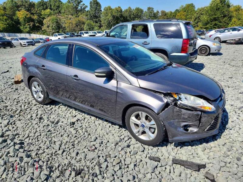 2014 Ford FOCUS (VIN 1FADP3F2XEL268377) — фото 4 из 13