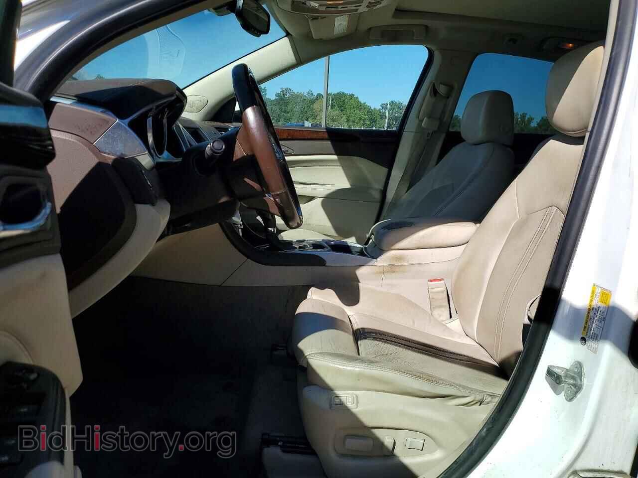 2012 Cadillac SRX (VIN 3GYFNBE39CS657686) — photo 7 of 13