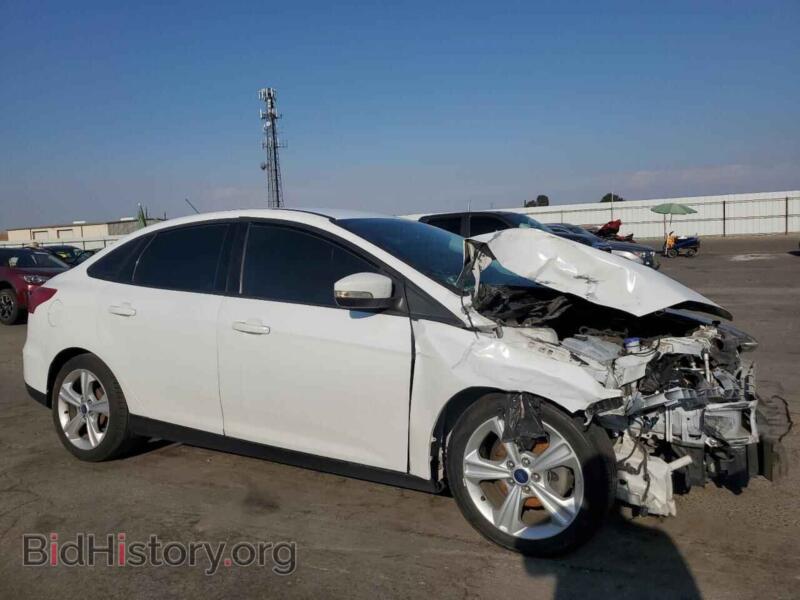 2016 Ford FOCUS (VIN 1FADP3F25GL384136) — фото 4 из 12