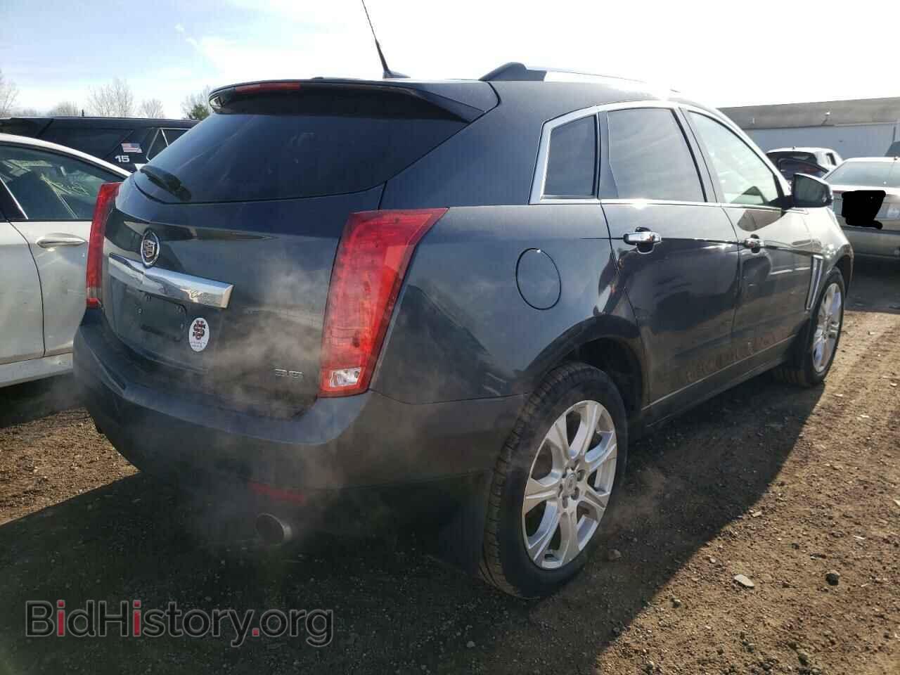 2013 CADILLAC SRX - VIN: 3GYFNHE31DS596435 - Фото 3