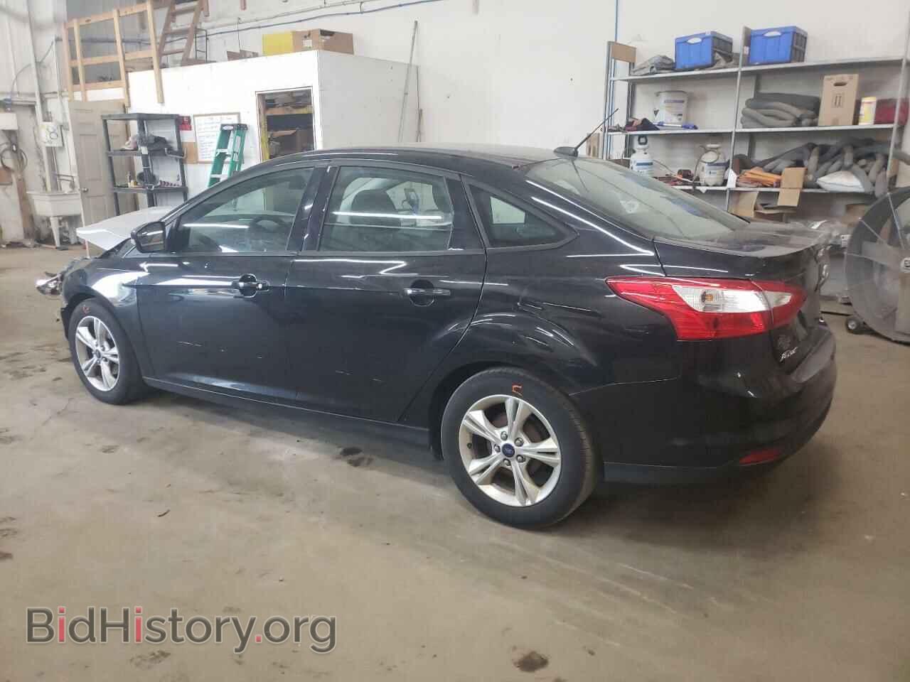 2014 FORD FOCUS - VIN: 1FADP3F21EL391047 - Photo 2