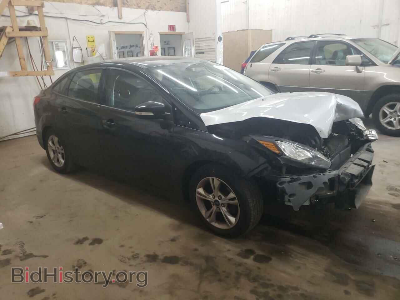 2014 FORD FOCUS - VIN: 1FADP3F21EL391047 - Photo 4