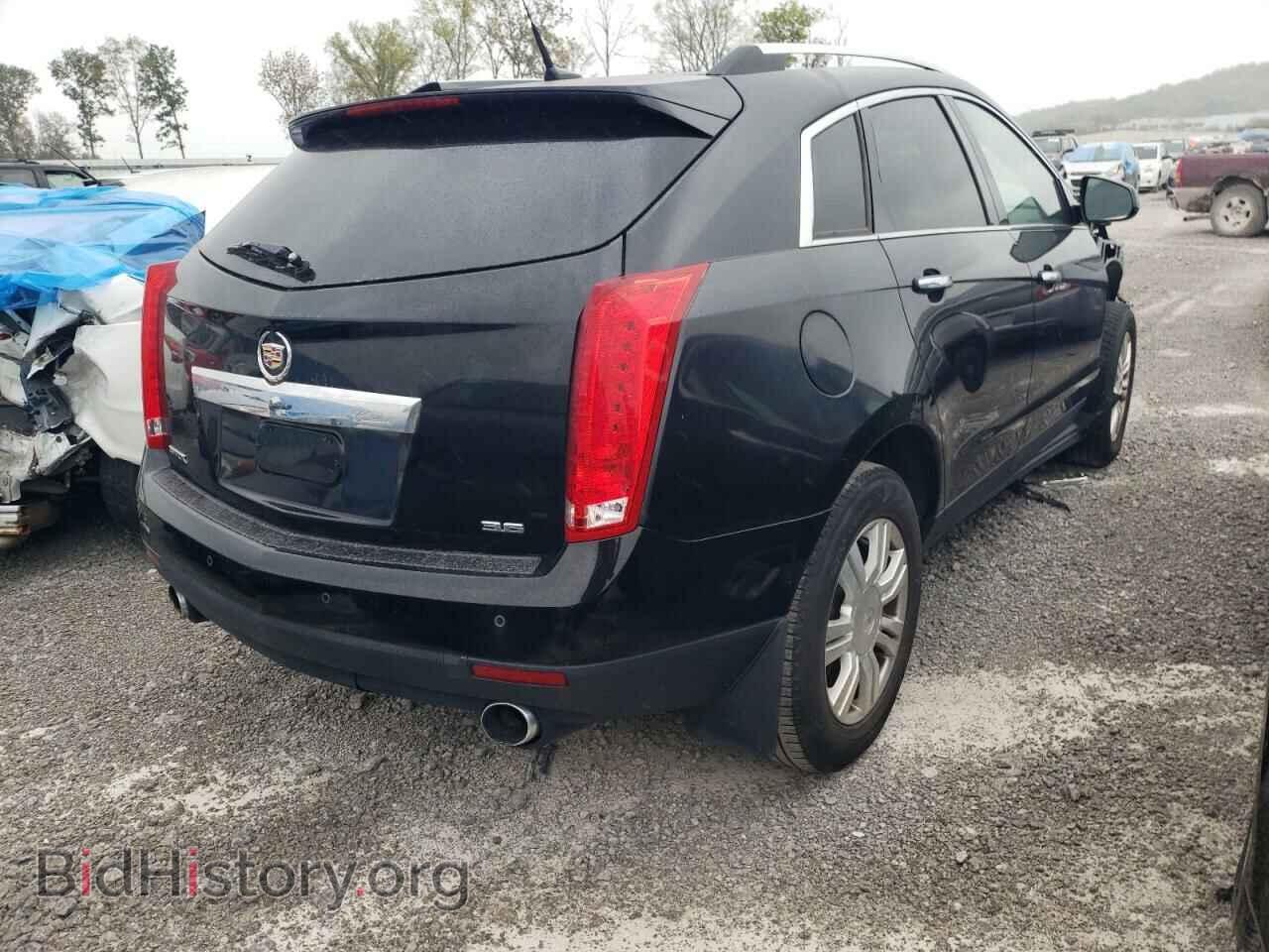 2014 CADILLAC SRX - VIN: 3GYFNBE30ES561822 - Фото 3