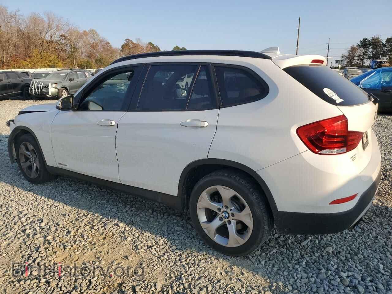 2014 BMW X1 - VIN: WBAVM1C52EVW55288 - Фото 2