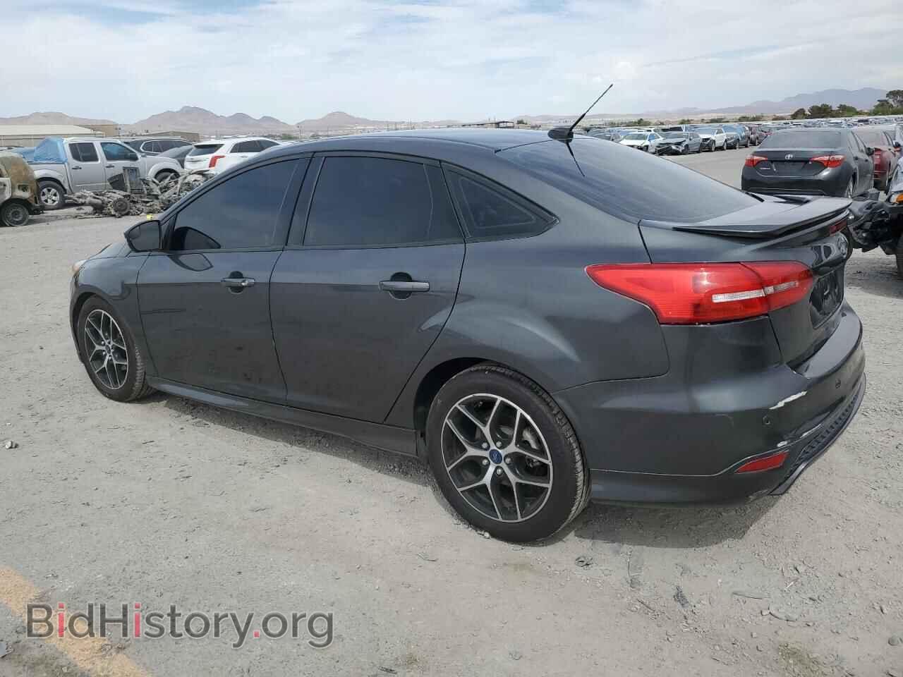 2016 FORD FOCUS - VIN: 1FADP3F29GL399271 - Фото 2