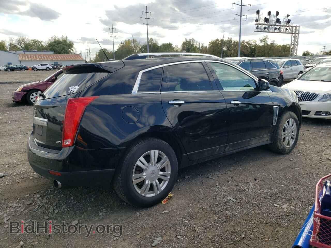 2014 CADILLAC SRX - VIN: 3GYFNEE31ES528037 - Фото 3