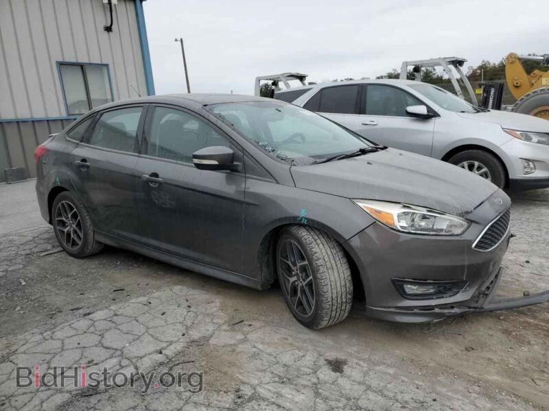 2015 Ford FOCUS (VIN 1FADP3F2XFL360249) — фото 4 из 12