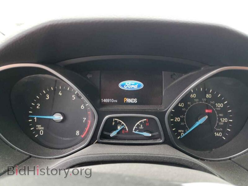 2015 Ford FOCUS (VIN 1FADP3F2XFL360249) — фото 9 из 12