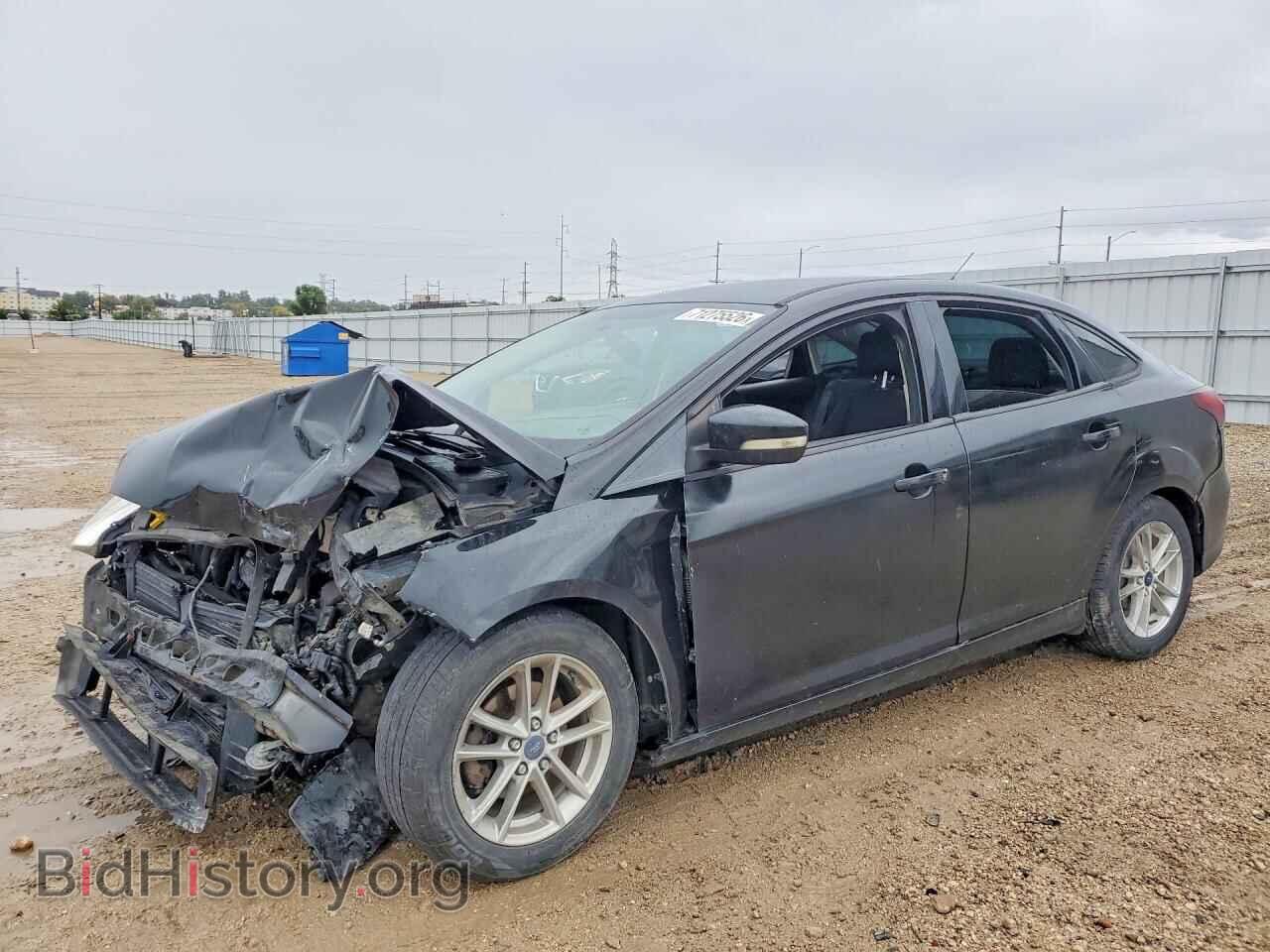 2016 Ford FOCUS SE (VIN 1FADP3F23GL403122) — photo 1 of 14, Copart, damage: front end