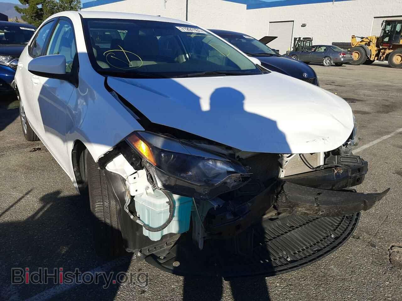 Фотография 5YFBURHEXEP053609 - TOYOTA COROLLA 2014