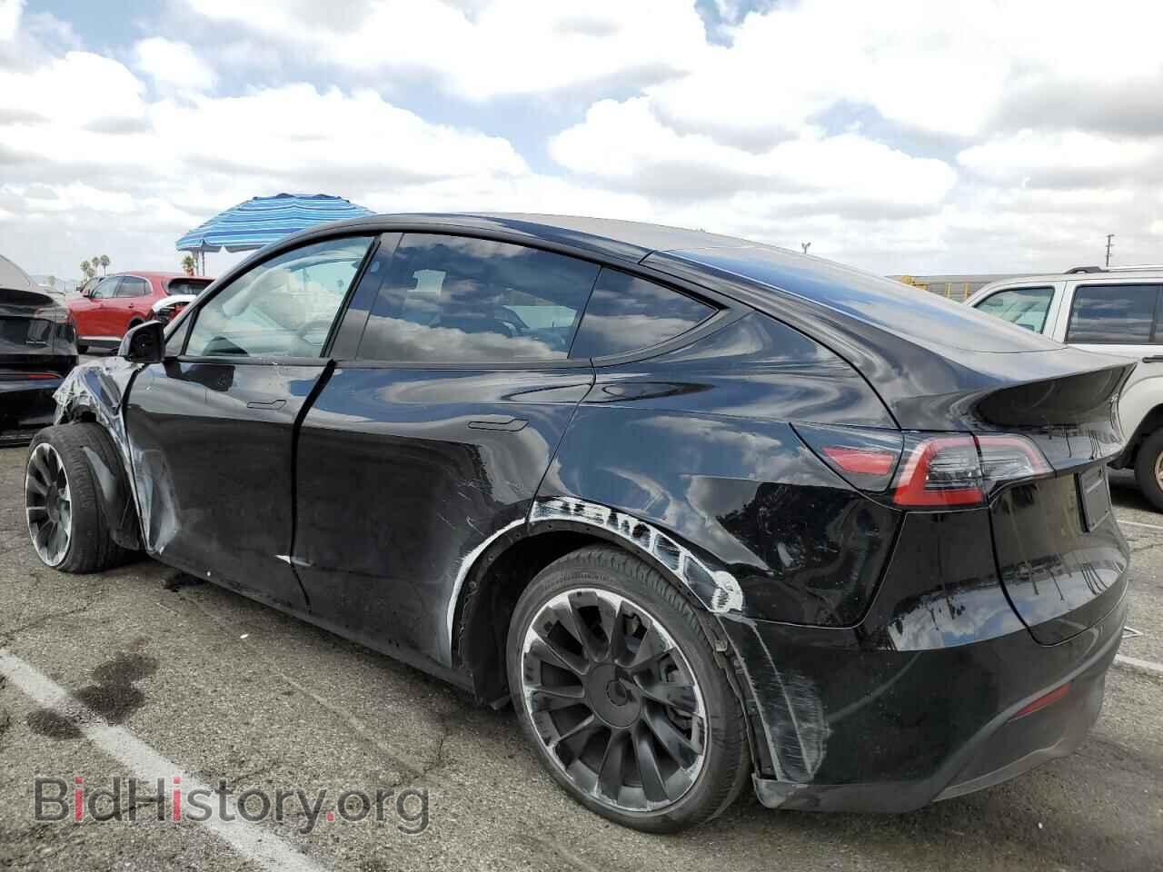 2023 TESLA MODEL Y - VIN: 7SAYGDED1PF941165 - Фото 2