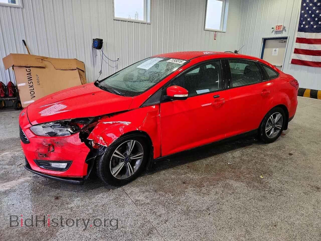 2016 Ford FOCUS SE (VIN 1FADP3FE7GL201992) — photo 1 of 14, Copart, damage: front end