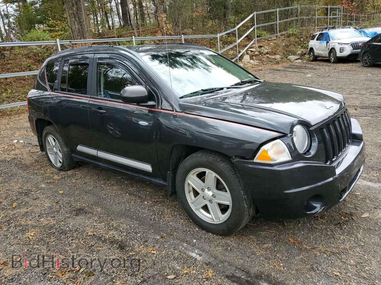 2010 JEEP COMPASS - VIN: 1J4NF1FB9AD671674 - Photo 4