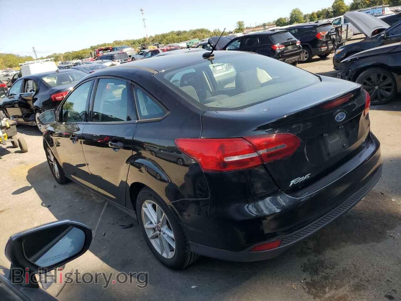2016 FORD FOCUS - VIN: 1FADP3F20GL347799 - Фото 2