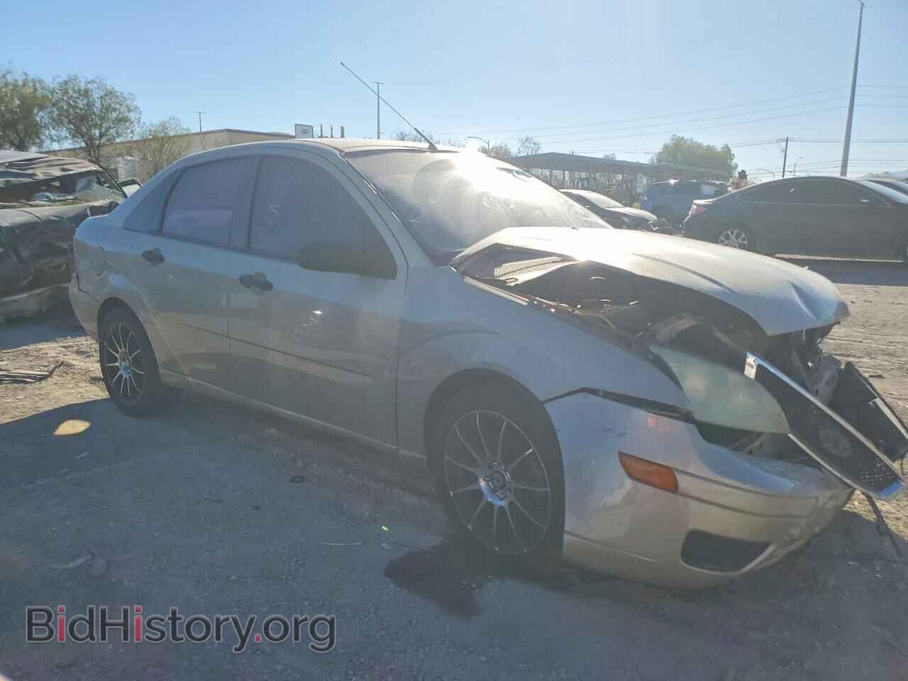 2006 Ford FOCUS (VIN 1FAFP34N76W209390) — фото 4 из 12