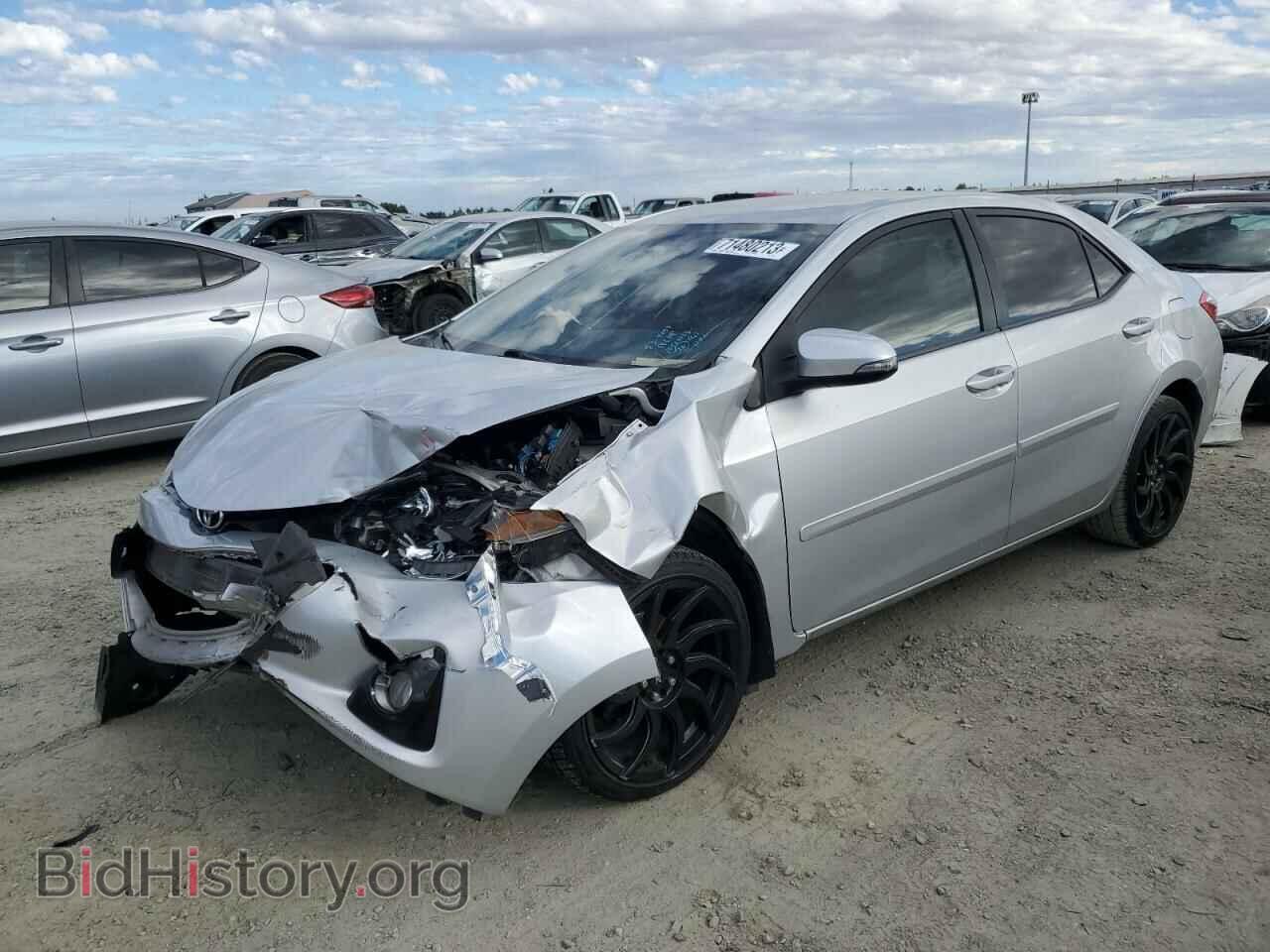Фотография 5YFBURHEXEP170882 - TOYOTA COROLLA 2014