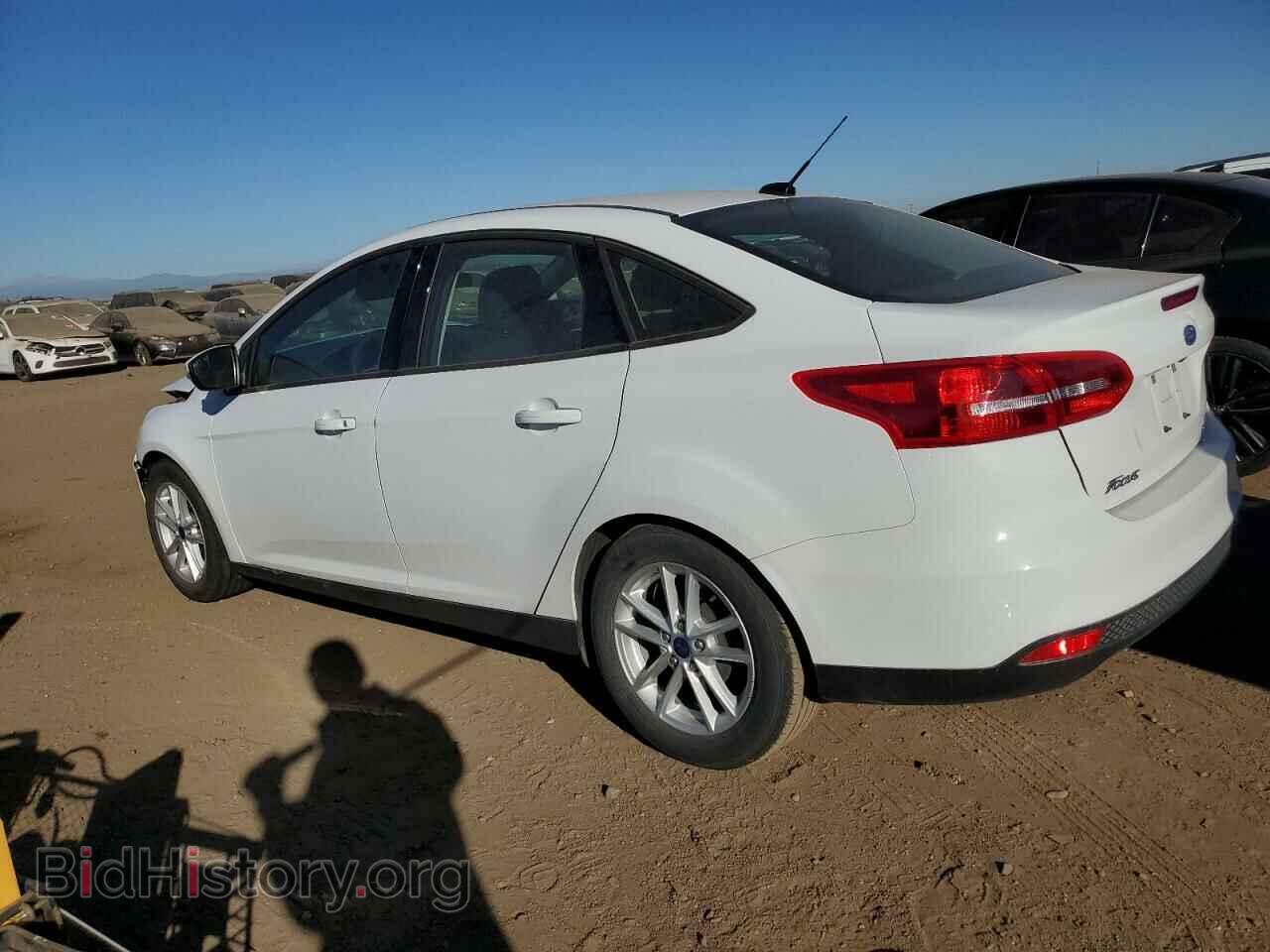 2016 FORD FOCUS - VIN: 1FADP3F23GL328888 - Фото 2