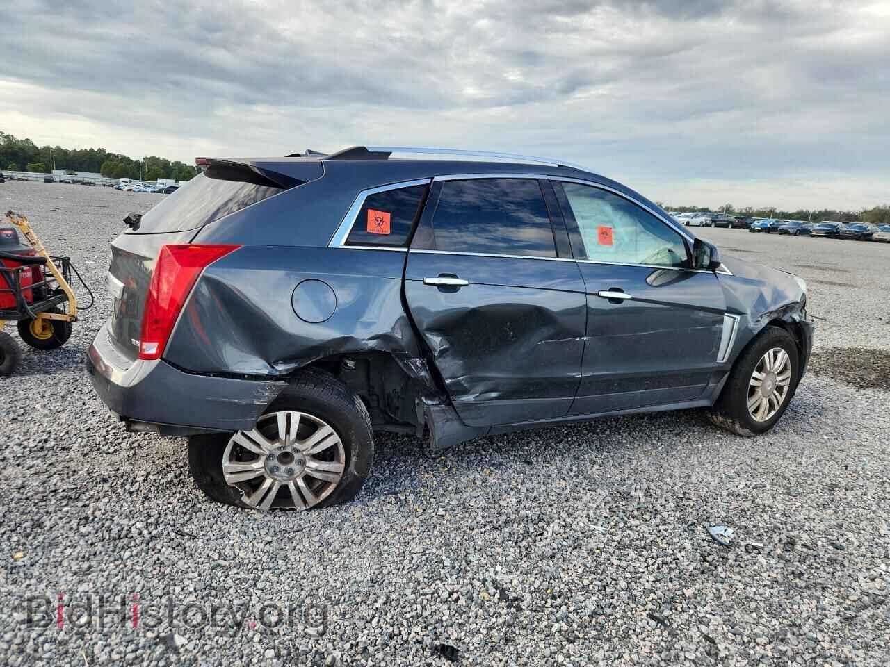 2013 CADILLAC SRX - VIN: 3GYFNCE39DS599120 - Фото 3