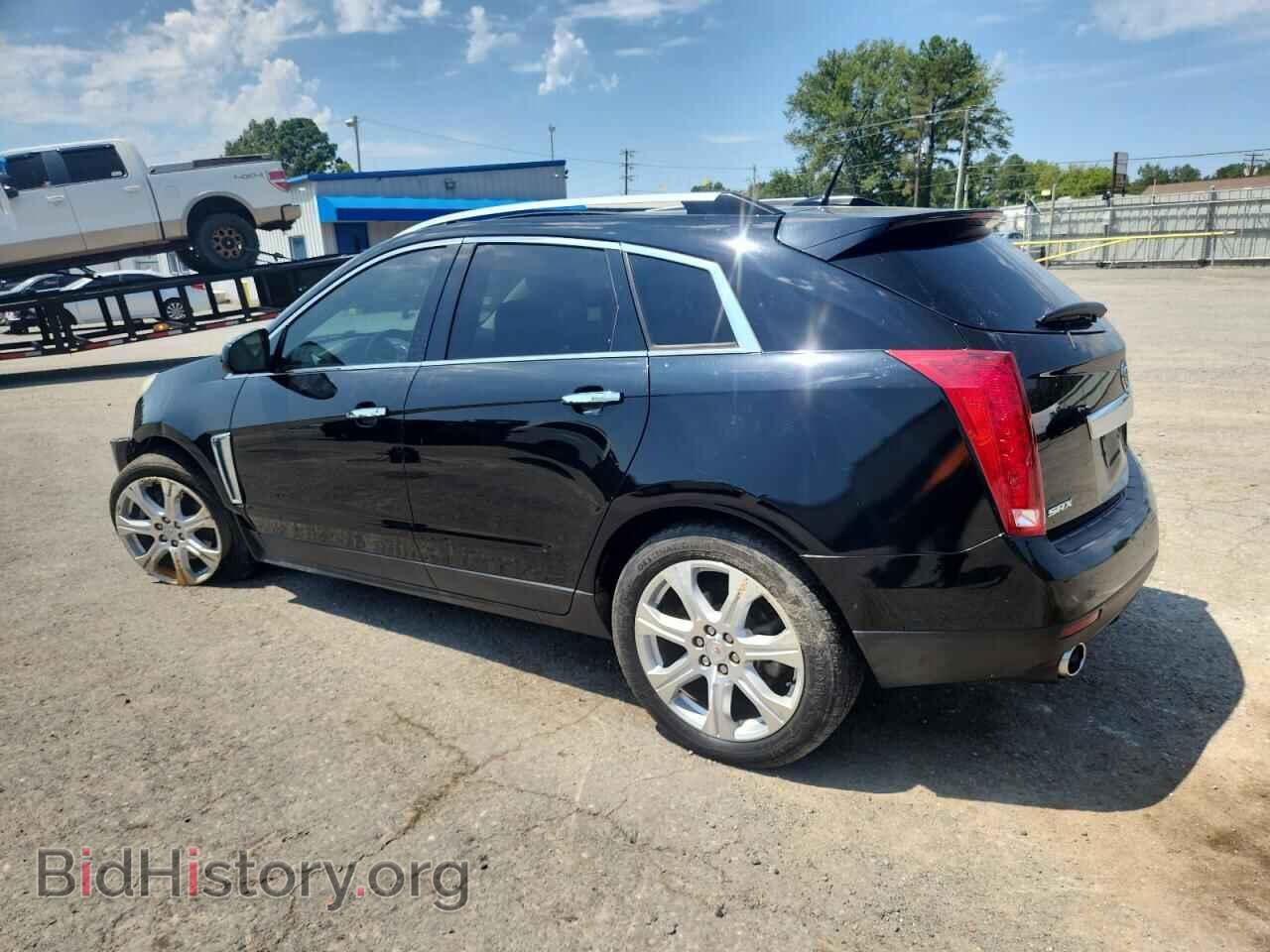 2014 CADILLAC SRX - VIN: 3GYFNDE31ES580133 - Фото 2