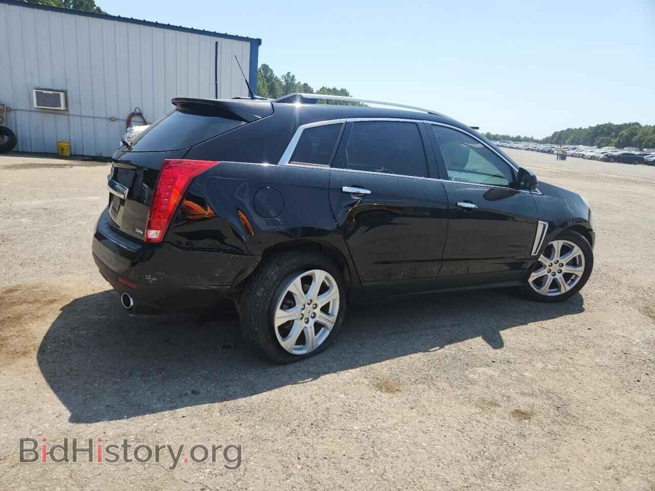 2014 CADILLAC SRX - VIN: 3GYFNDE31ES580133 - Фото 3