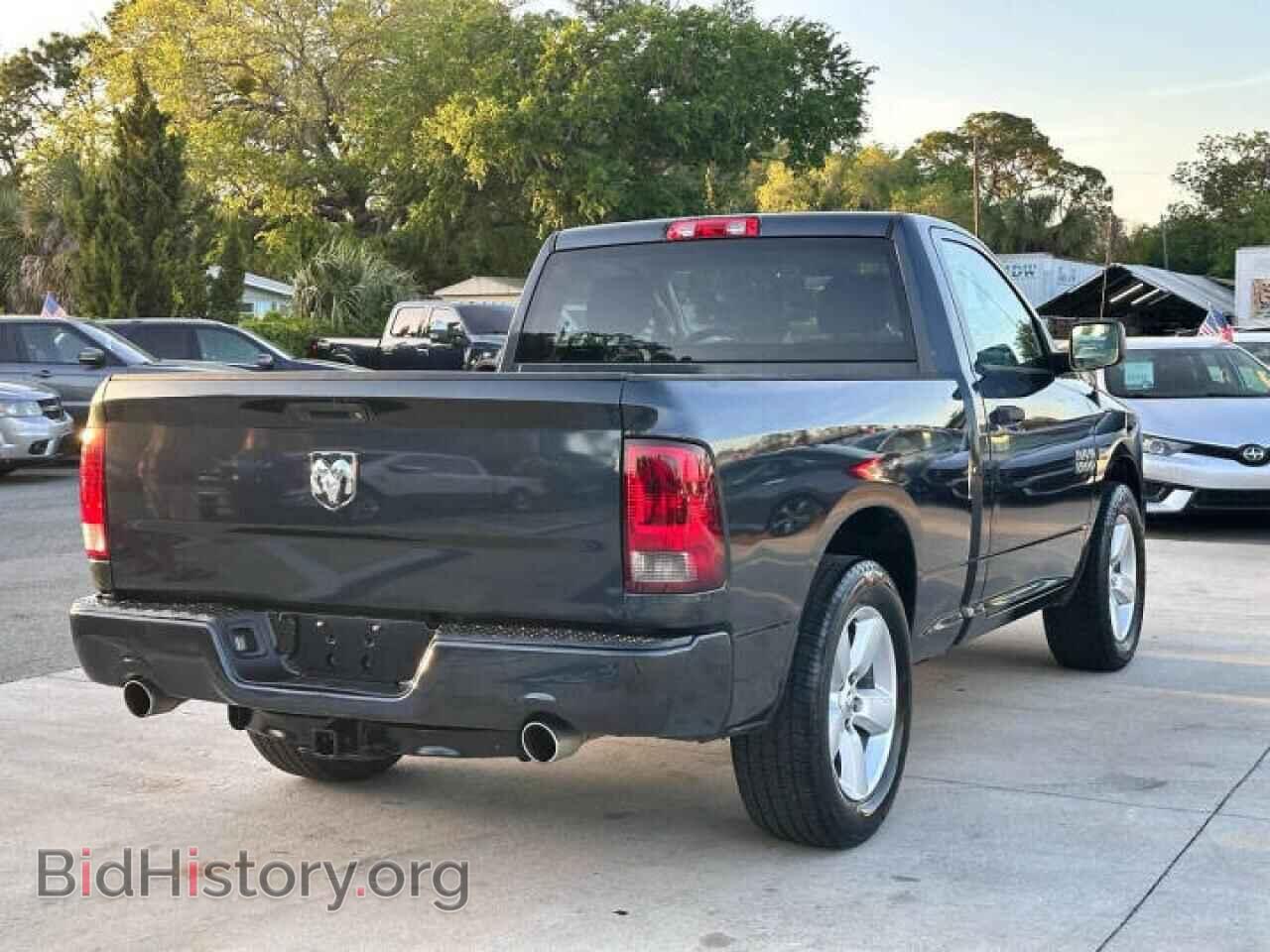 2014 RAM 1500 - VIN: 3C6JR6AT2EG257XXX - Фото 4