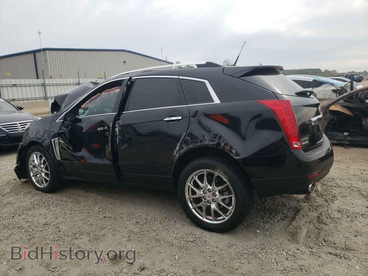 2014 CADILLAC SRX - VIN: 3GYFNCE32ES562055 - Фото 2