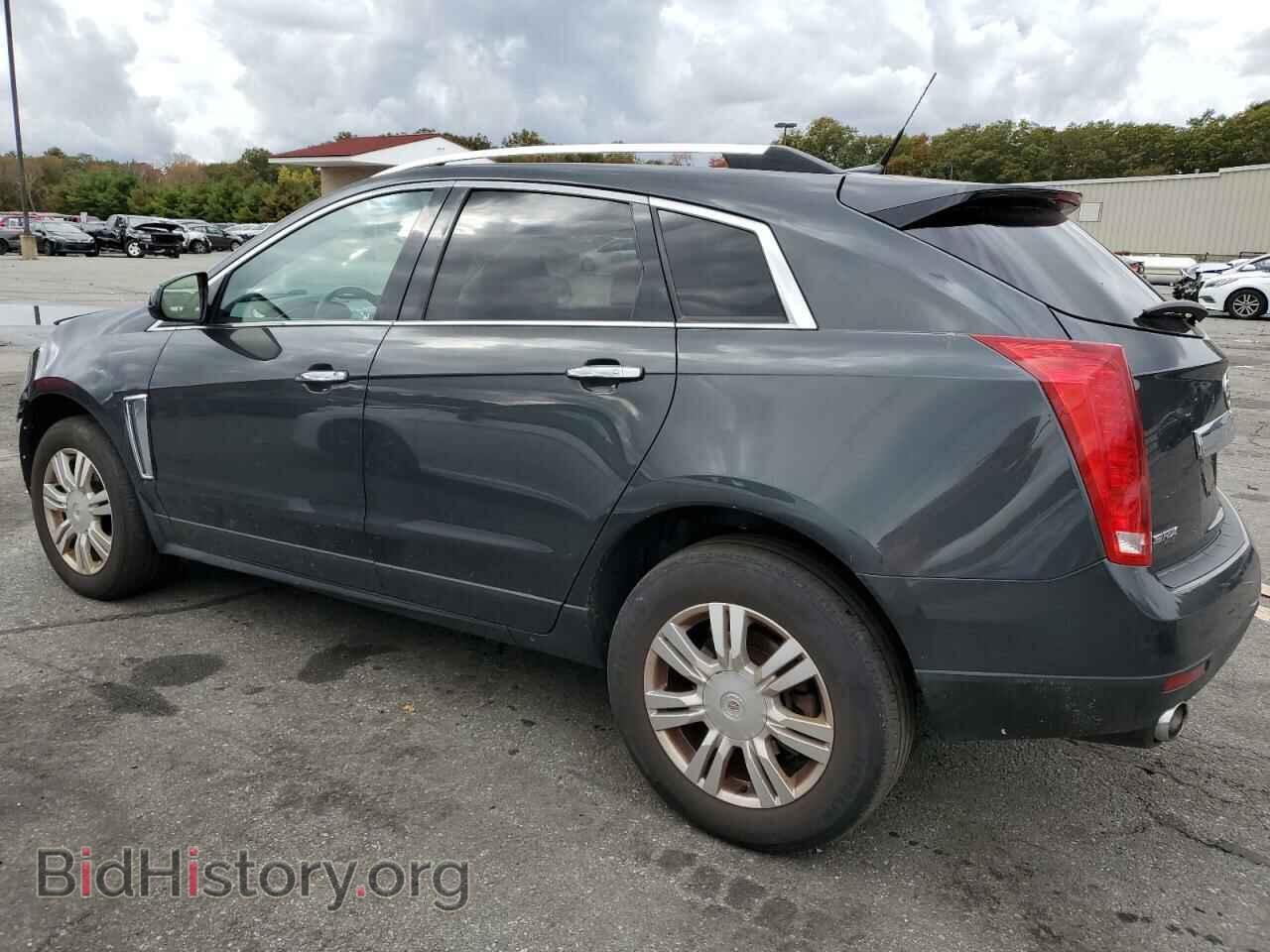 2014 CADILLAC SRX - VIN: 3GYFNBE37ES663148 - Фото 2