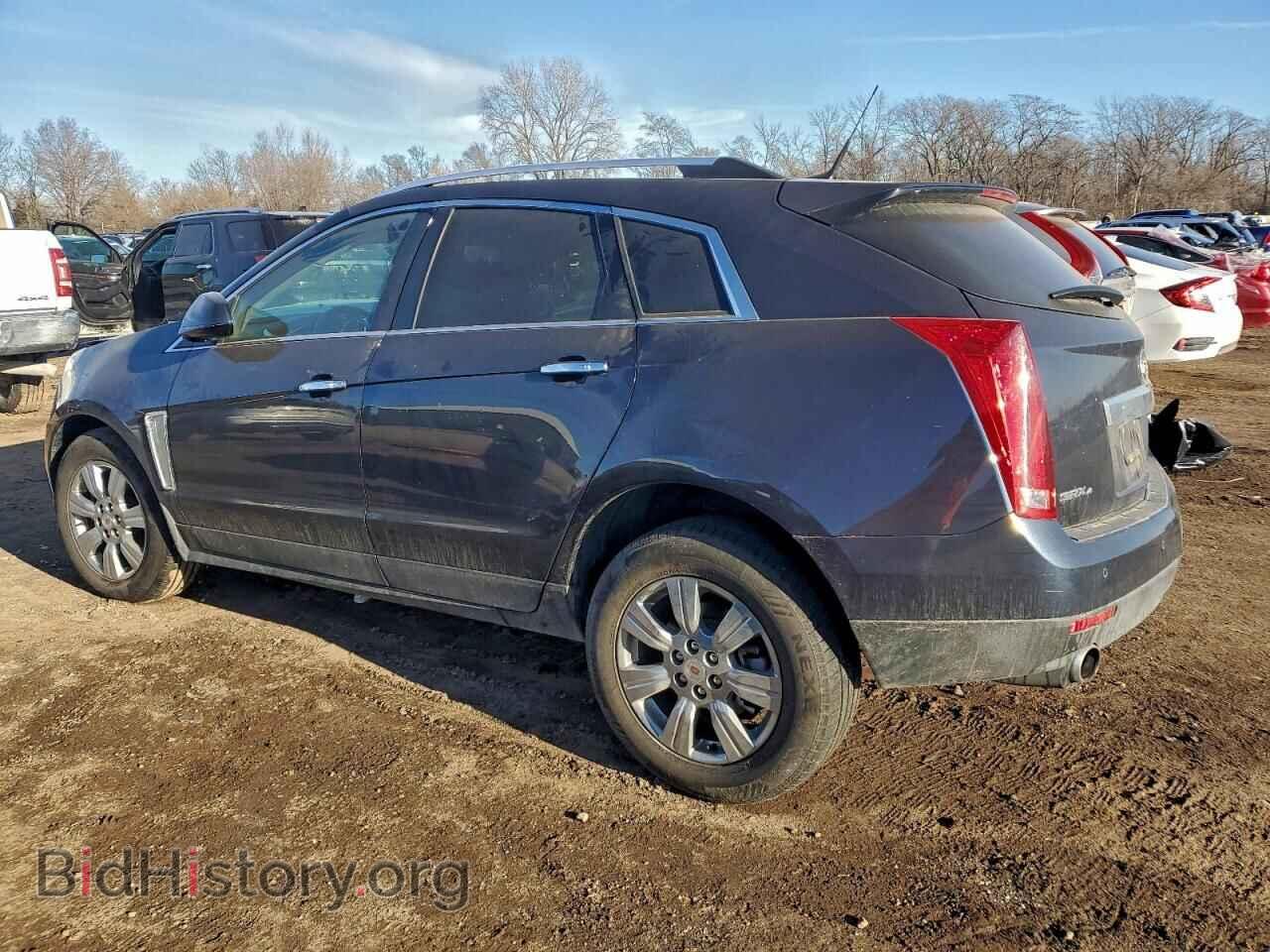 2014 CADILLAC SRX - VIN: 3GYFNEE37ES563889 - Фото 2