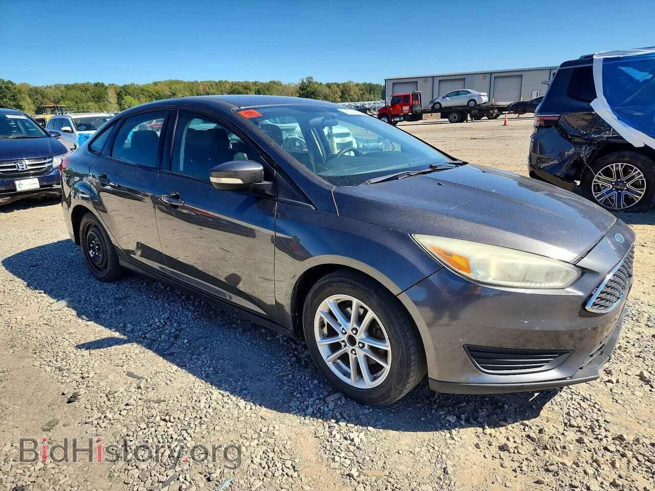 2015 FORD FOCUS - VIN: 1FADP3F22FL214394 - Photo 4
