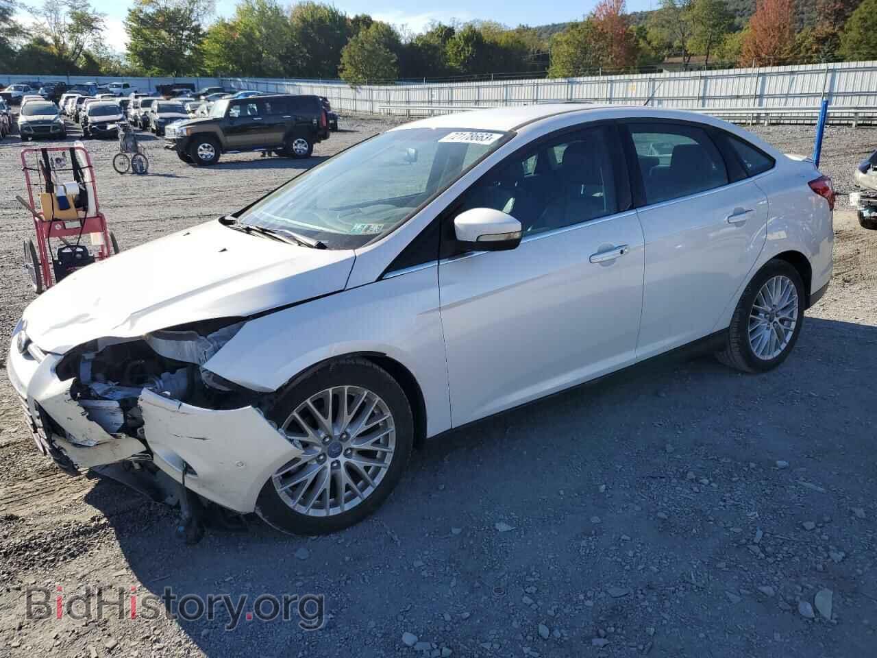 Фотография 1FADP3J20DL129221 - FORD FOCUS 2013