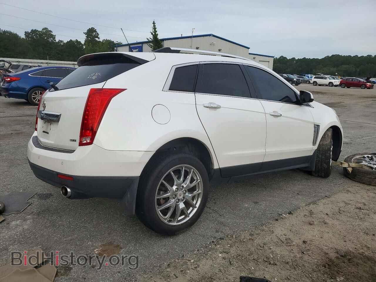 2014 CADILLAC SRX - VIN: 3GYFNCE35ES682643 - Фото 3
