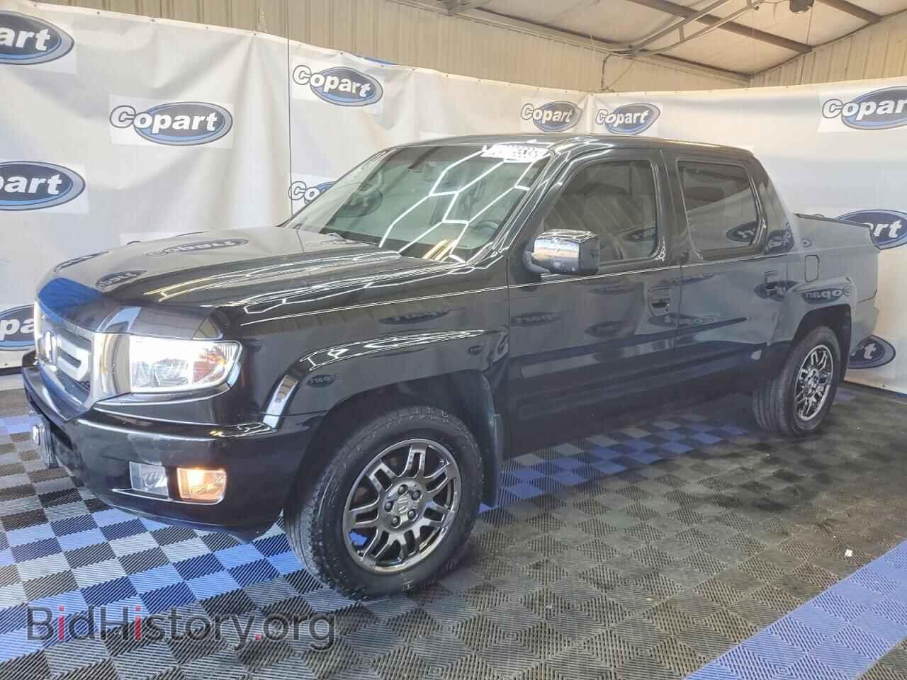 Photo 5FPYK1F50BB452435 - HONDA RIDGELINE 2011