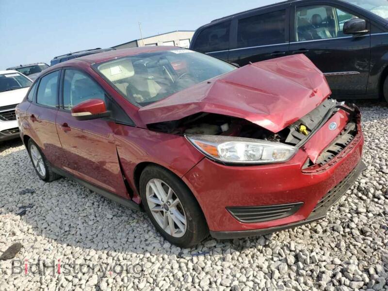 2016 Ford FOCUS (VIN 1FADP3F29GL323775) — фото 4 из 12