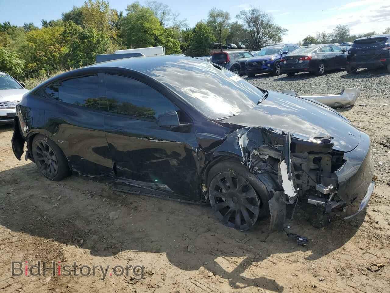 2023 TESLA MODEL Y - VIN: 7SAYGDEE4PF691672 - Photo 4