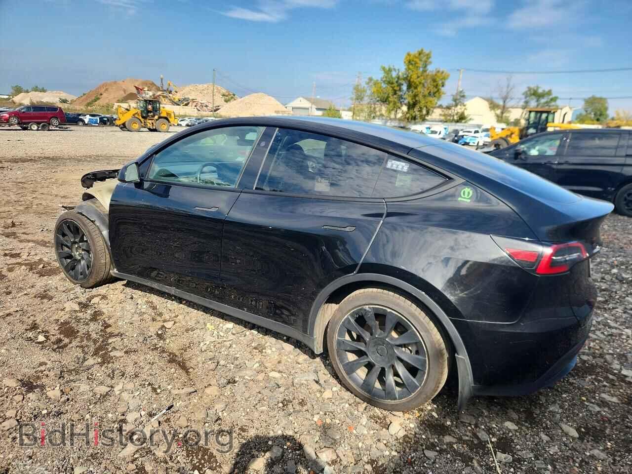 2023 TESLA MODEL Y - VIN: 7SAYGAEE2PF921238 - Photo 2