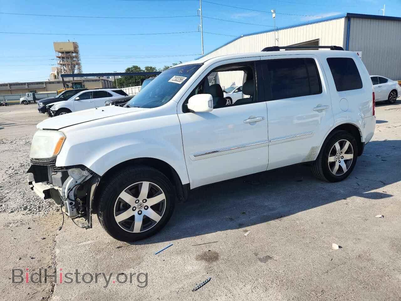 2012 Honda PILOT Touring (VIN 5FNYF4H96CB061354) — photo 1 of 13, Copart, damage: front end