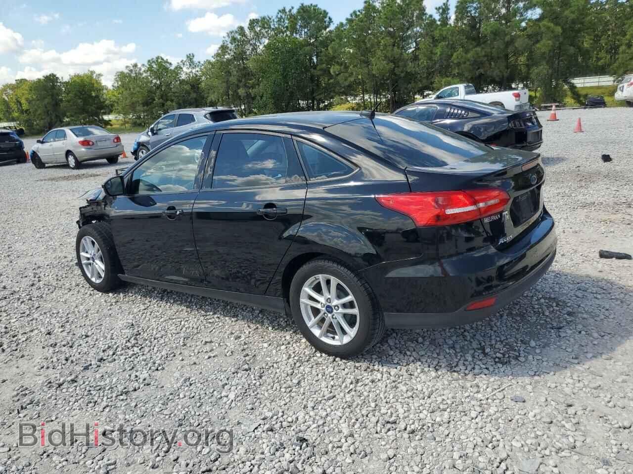 2016 FORD FOCUS - VIN: 1FADP3F20GL404700 - Фото 2