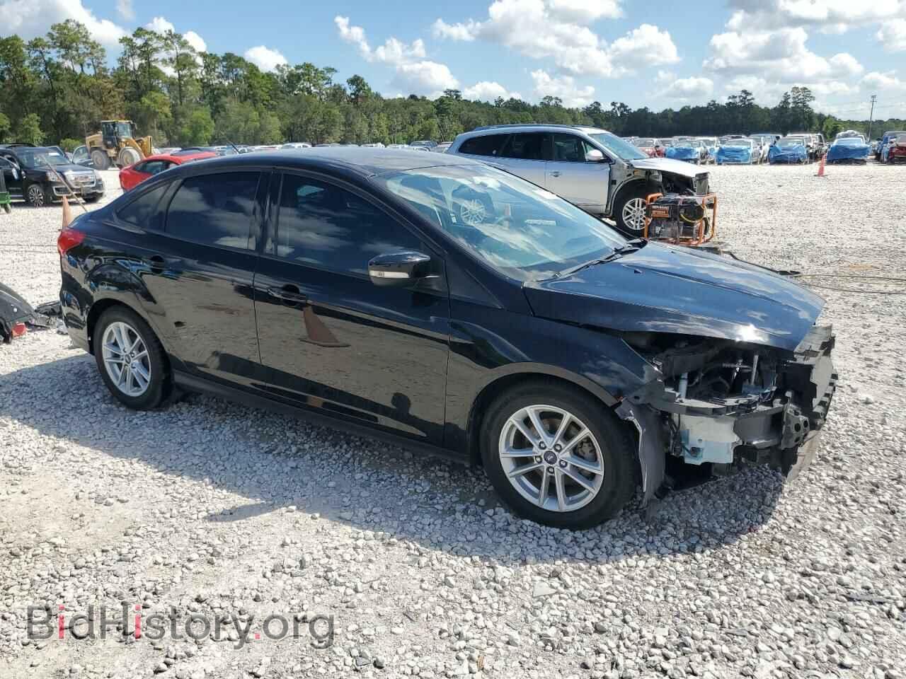 2016 FORD FOCUS - VIN: 1FADP3F20GL404700 - Фото 4