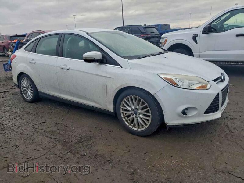 2012 Ford FOCUS (VIN 1FAHP3H21CL241998) — photo 4 of 12