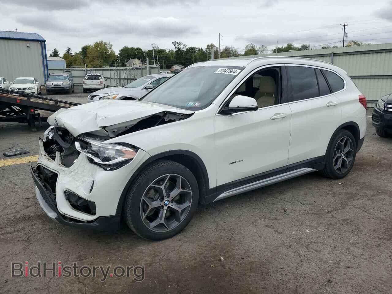 Фотография WBXHT3C34G5E55146 - BMW X1 2016