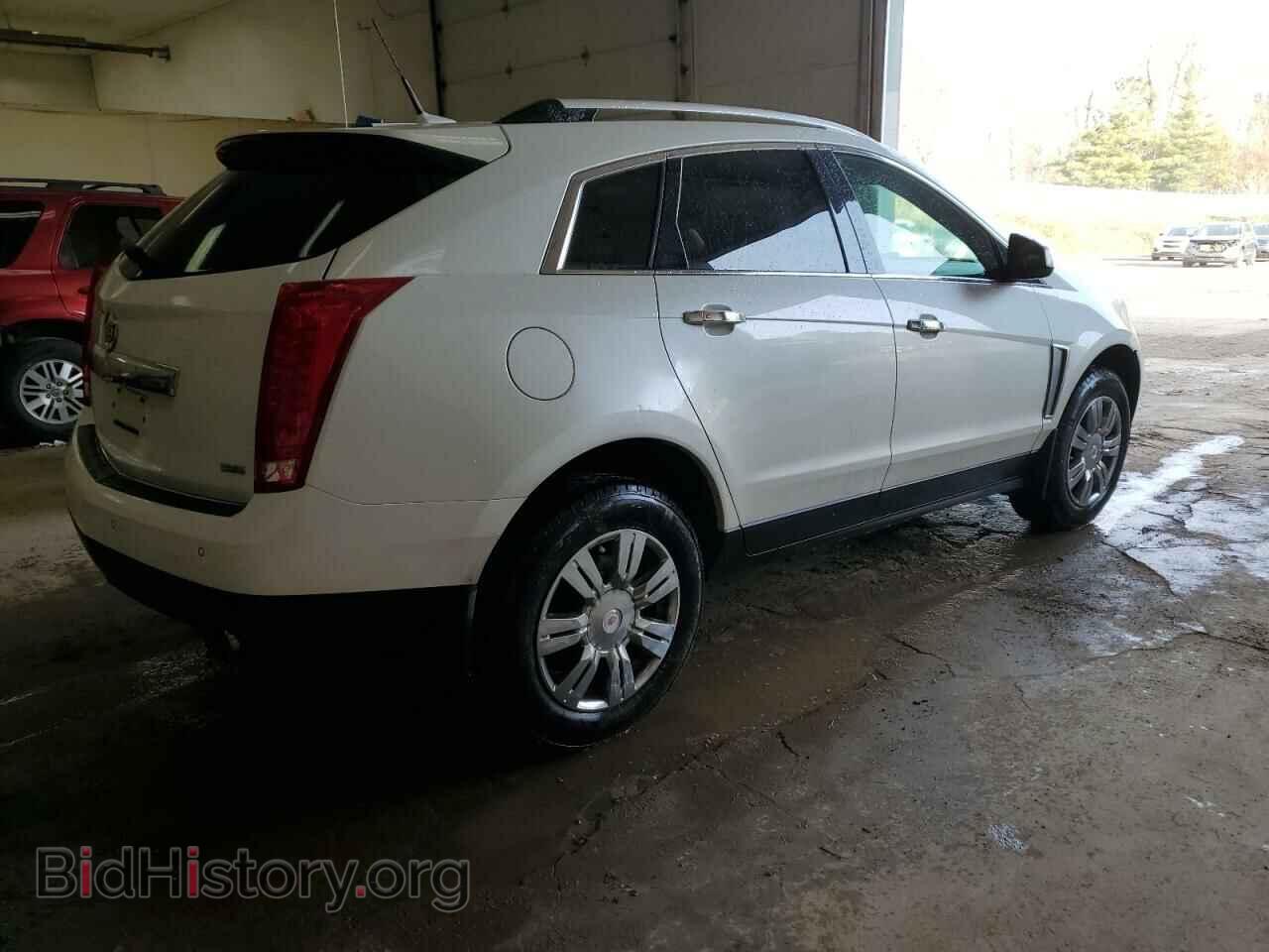 2014 CADILLAC SRX - VIN: 3GYFNBE32ES526201 - Фото 3