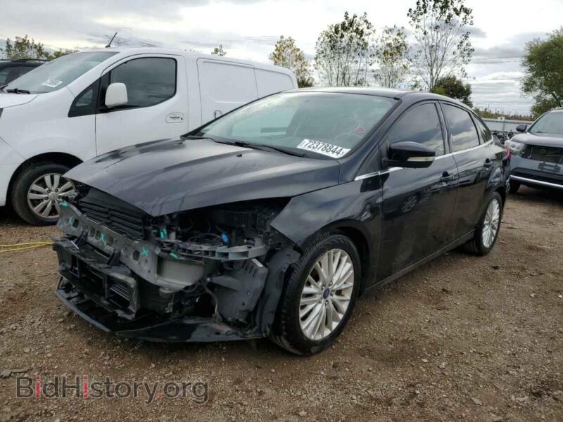 2017 Ford FOCUS TITANIUM (VIN 1FADP3J21HL323990) — фото 1 из 12, Copart, повреждение: передняя часть