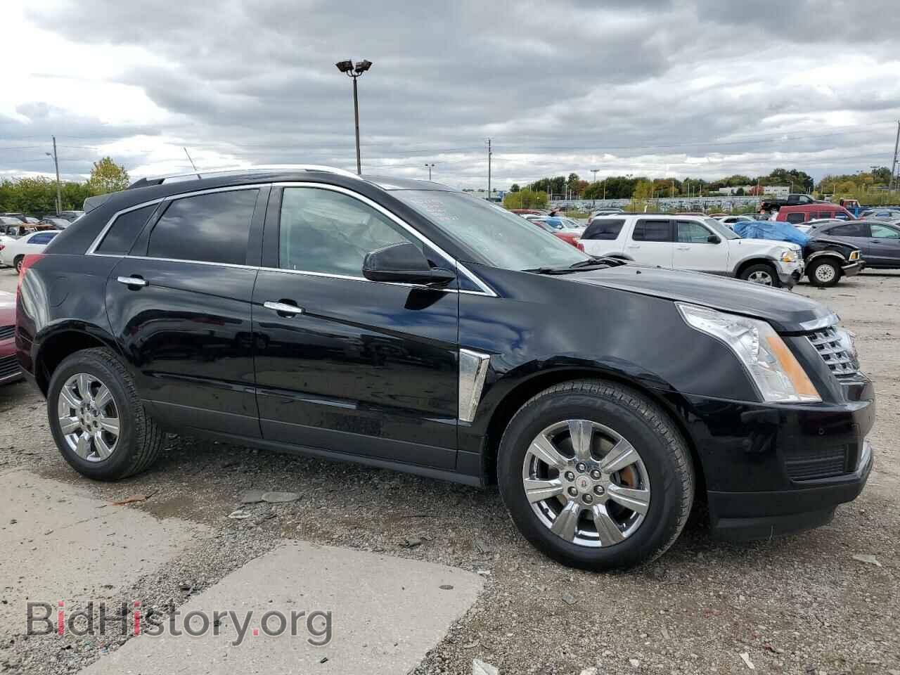 2014 CADILLAC SRX - VIN: 3GYFNBE37ES596454 - Фото 4