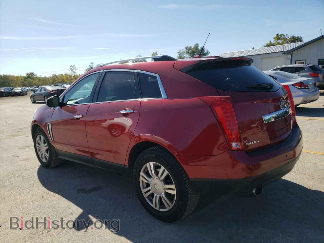 2014 CADILLAC SRX - VIN: 3GYFNEE3XES676848 - Фото 2