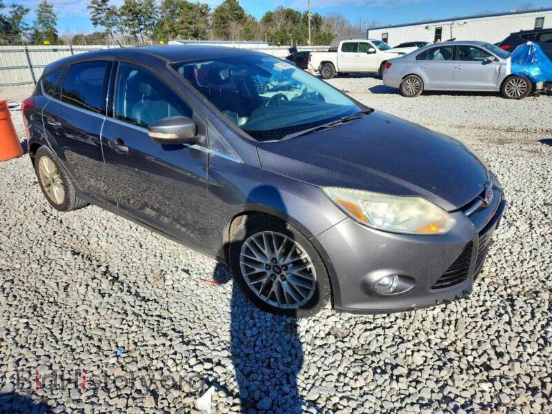 2012 Ford FOCUS (VIN 1FAHP3M24CL341518) — photo 4 of 14
