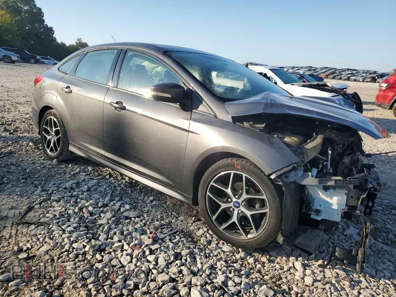 2015 FORD FOCUS - VIN: 1FADP3F20FL235261 - Photo 4