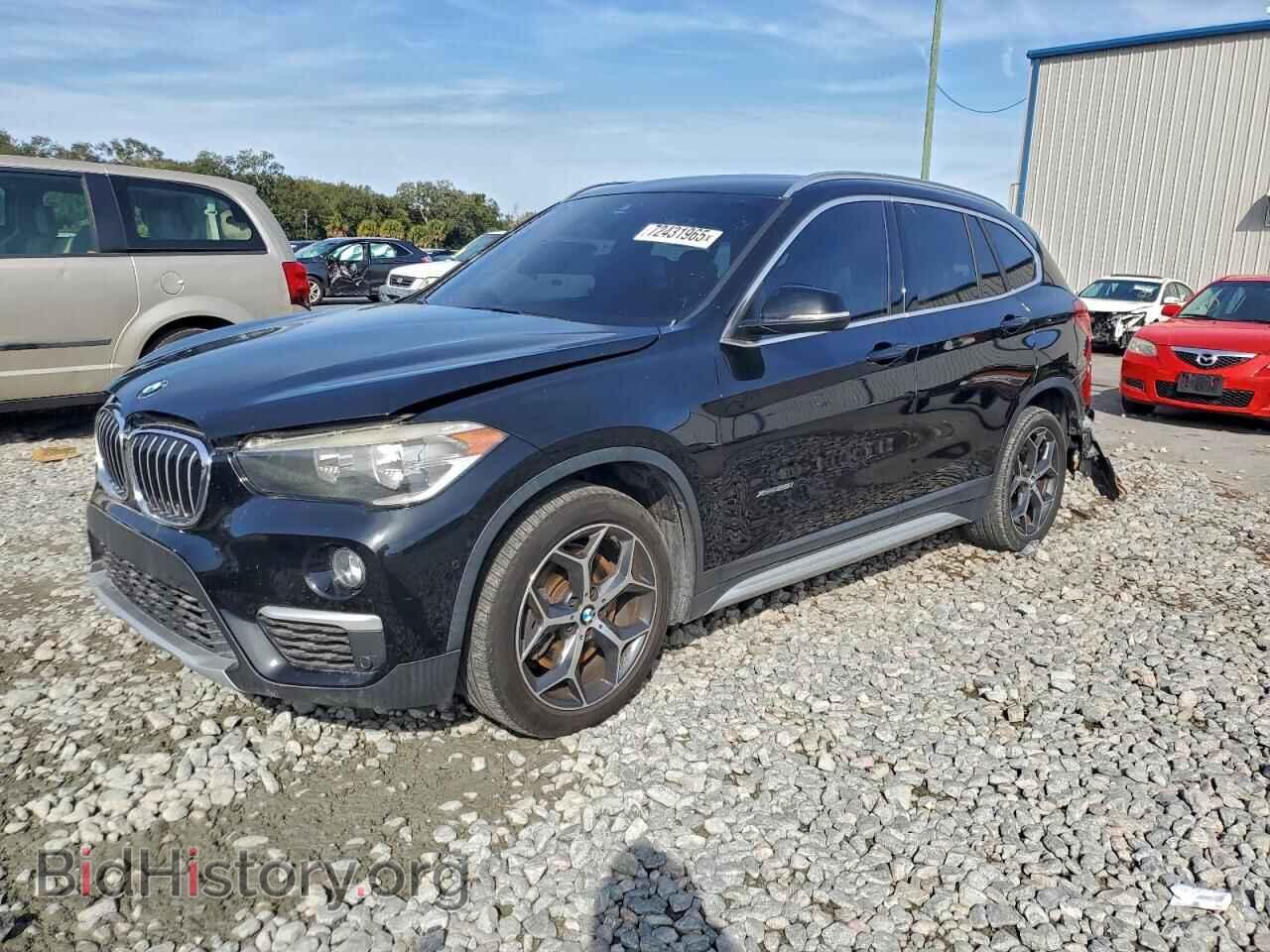 Фотография WBXHT3C31GP884584 - BMW X1 2016