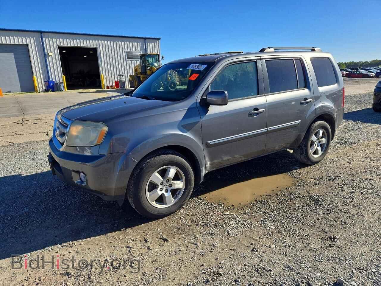 2011 Honda PILOT EXL (VIN 5FNYF3H52BB032889) — photo 1 of 13, Copart, damage: minor dents/scratches