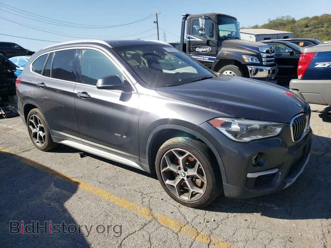 2017 BMW X1 - VIN: WBXHT3Z36H4A52011 - Фото 4