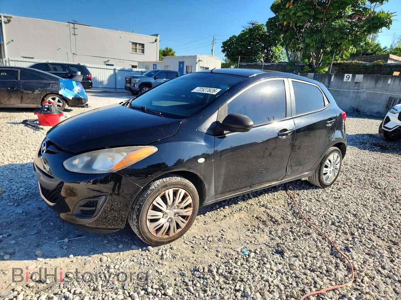 2012 Mazda 2 (VIN JM1DE1KZ9C0143215) — фото 1 из 12, Copart, повреждение: бок
